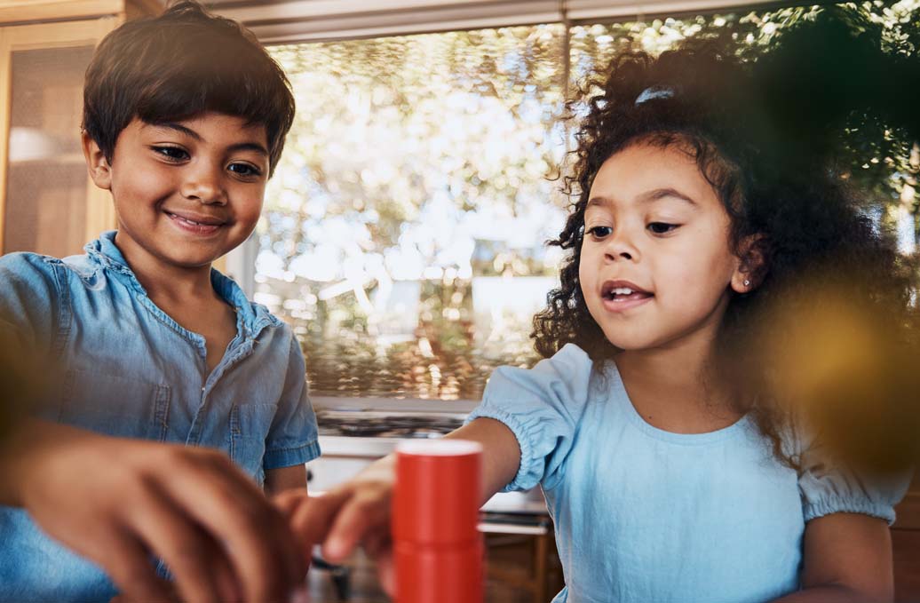 children-playing-table-game-being-social